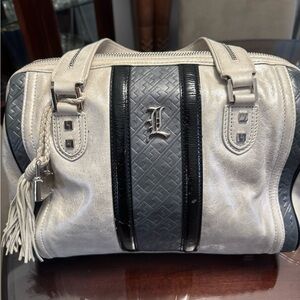 Chic Cream and Black Satchel